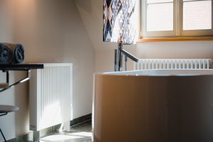 How much do you save by turning of a radiator?
